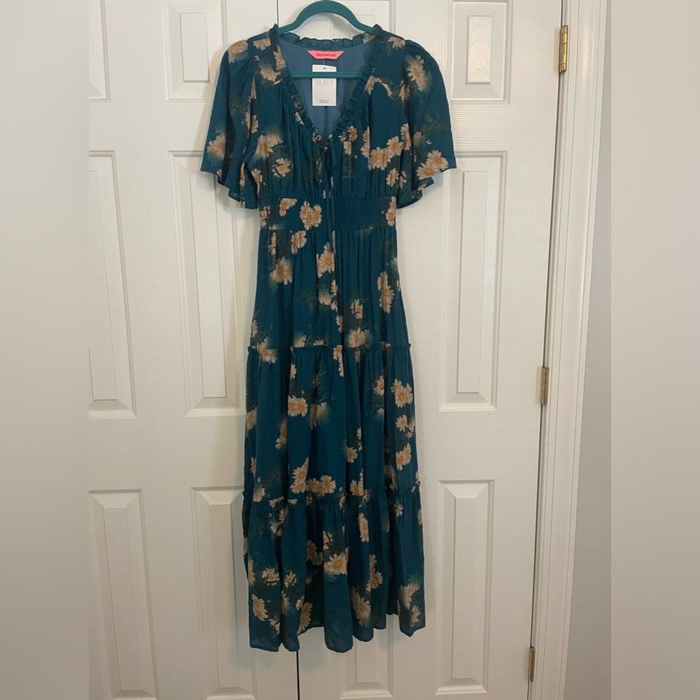 Midi dress brand new with tags it has pockets